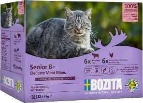 Multibox med 12 enportionsförpackningar av balanserat helfoder för äldre katter, innehållande cellulosafibrer för hårbollar och glukosamin för hälsosamma leder.