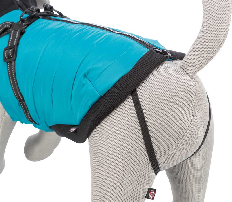 Pontis Täcke med sele för hund, i polyester med fleecefoder och vaddering. Reflekterande detaljer och justerbara öglor för bakbenen för en säker och bekväm passform.